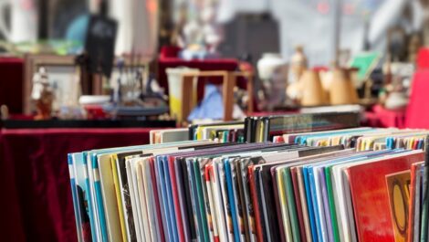 A flea market space filled with various collectibles on display.