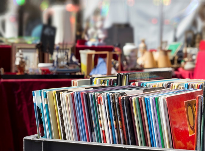 A flea market space filled with various collectibles on display.