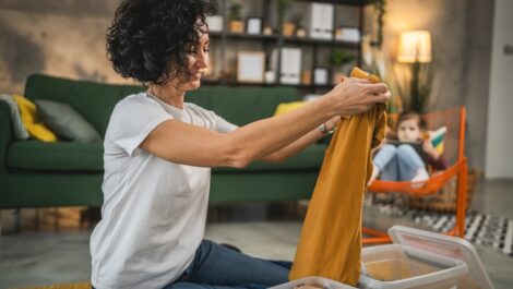 Woman Folding clothing