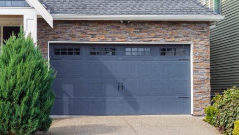 A blue garage door that is closed